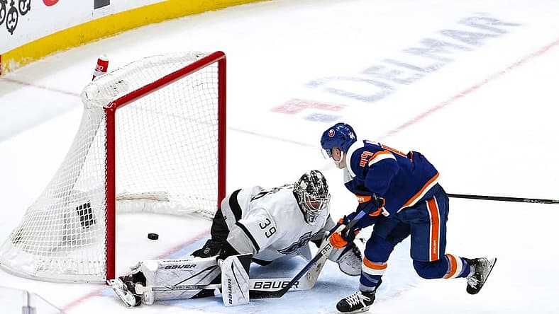Dec 9, 2023; Elmont, New York, USA; New York Islanders center Jean-Gabriel Pageau (44) scores the game winning goal in overtime against Los Angeles Kings goaltender Cam Talbot (39) at UBS Arena. Mandatory Credit: John Jones-USA TODAY Sports