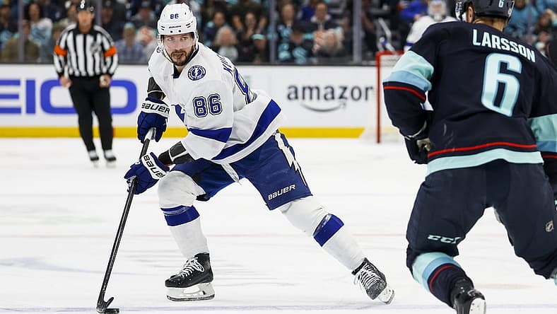 Dec 9, 2023; Seattle, Washington, USA; Tampa Bay Lightning right wing Nikita Kucherov (86) skates with the puck against the Seattle Kraken during the first period at Climate Pledge Arena. Mandatory Credit: Joe Nicholson-USA TODAY Sports