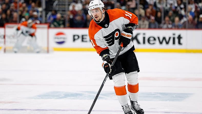 Dec 9, 2023; Denver, Colorado, USA; Philadelphia Flyers right wing Travis Konecny (11) controls the puck on a penalty shot in the third period against the Colorado Avalanche at Ball Arena. Mandatory Credit: Isaiah J. Downing-USA TODAY Sports