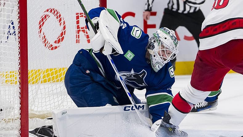 Dec 9, 2023; Vancouver, British Columbia, CAN; Vancouver Canucks goalie Thatcher Demko (35) makes a save against the Carolina Hurricanes in the second period at Rogers Arena. Mandatory Credit: Bob Frid-USA TODAY Sports