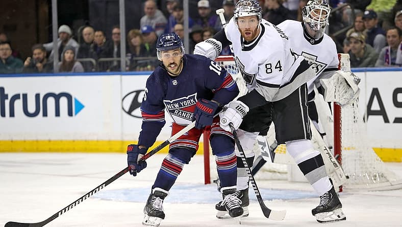 Dec 10, 2023; New York, New York, USA; New York Rangers center Vincent Trocheck (16) and Los Angeles Kings defenseman Vladislav Gavrikov (84) battle for position in front of Los Angeles Kings goalie Pheonix Copley (29) during the first period at Madison Square Garden. Mandatory Credit: Danny Wild-USA TODAY Sports