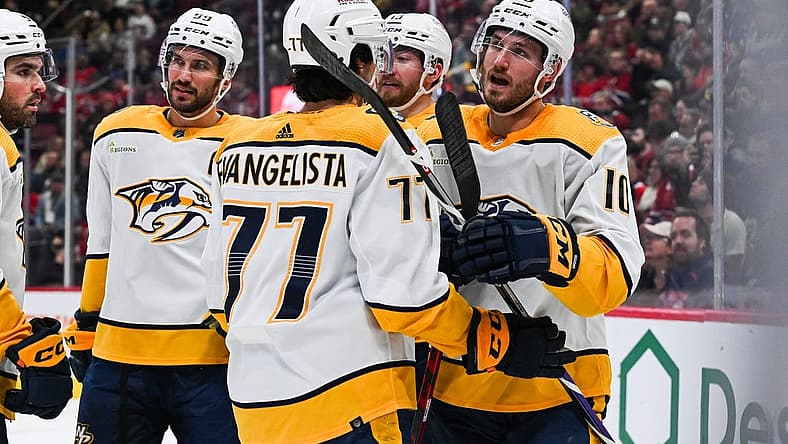 Dec 10, 2023; Montreal, Quebec, CAN; Nashville Predators center Colton Sissons (10) celebrates his goal against the Montreal Canadiens with his teammates during the second period at Bell Centre. Mandatory Credit: David Kirouac-USA TODAY Sports