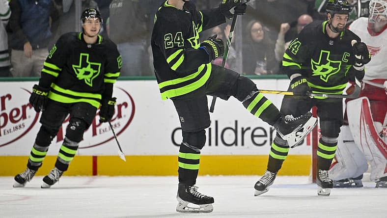 Dec 11, 2023; Dallas, Texas, USA; Dallas Stars center Roope Hintz (24) and left wing Jason Robertson (21) and left wing Jamie Benn (14) celebrates a goal scored by center Joe Pavelski (not pictured) against the Detroit Red Wings during the third period at the American Airlines Center. Mandatory Credit: Jerome Miron-USA TODAY Sports