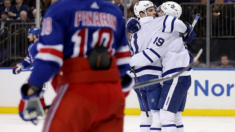 Dec 12, 2023; New York, New York, USA; Toronto Maple Leafs center Calle Jarnkrok (19) celebrates his goal against the New York Rangers with center John Tavares (91) during the first period at Madison Square Garden. Mandatory Credit: Brad Penner-USA TODAY Sports