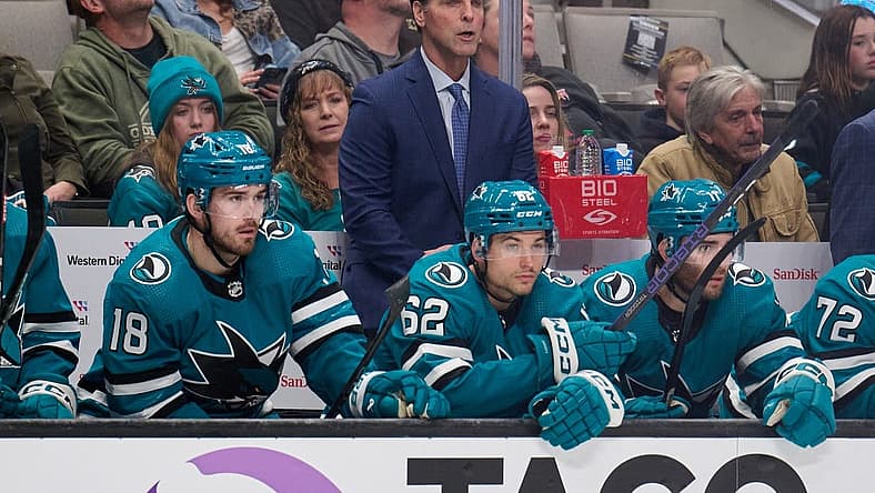 Dec 12, 2023; San Jose, California, USA; San Jose Sharks head coach David Quinn watches the game from the bench against the Winnipeg Jets during the first period at SAP Center at San Jose. Mandatory Credit: Robert Edwards-USA TODAY Sports
