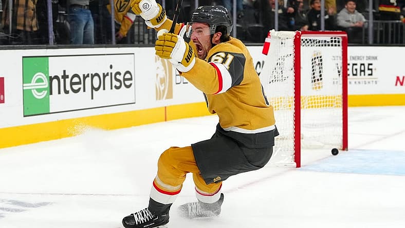 Dec 12, 2023; Las Vegas, Nevada, USA; Vegas Golden Knights right wing Mark Stone (61) celebrates after scoring a goal against Calgary Flames goaltender Dustin Wolf (32) during an overtime period to give the Golden Knights a 5-4 victory at T-Mobile Arena. Mandatory Credit: Stephen R. Sylvanie-USA TODAY Sports