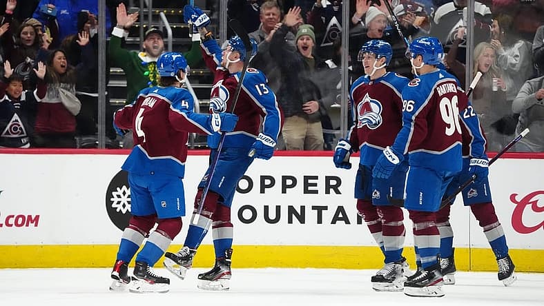 Dec 13, 2023; Denver, Colorado, USA; Colorado Avalanche right wing Valeri Nichushkin (13) (center) celebrates his goal in the first period against the Buffalo Sabres at Ball Arena. Mandatory Credit: Ron Chenoy-USA TODAY Sports