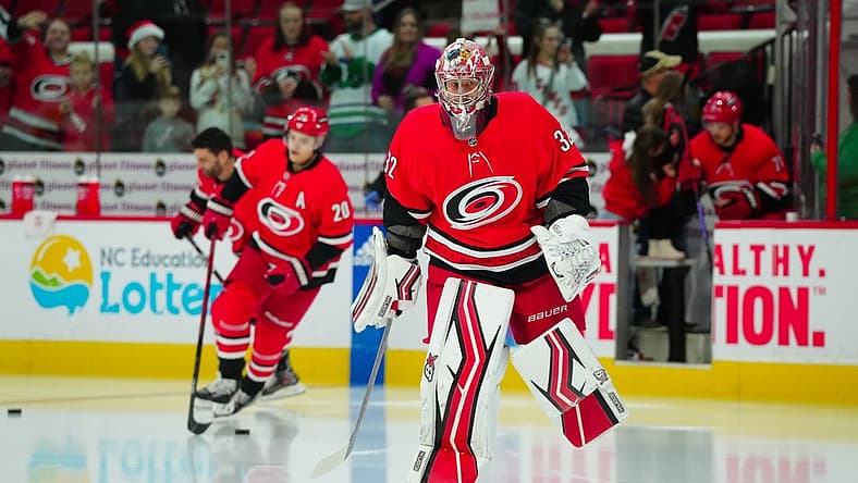 Dec 15, 2023; Raleigh, North Carolina, USA; Carolina Hurricanes goaltender Antti Raanta (32) skates out onto the ice before the game against the Nashville Predators at PNC Arena. Mandatory Credit: James Guillory-USA TODAY Sports