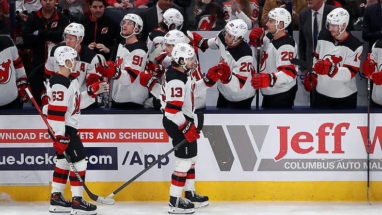Dec 16, 2023; Columbus, Ohio, USA; New Jersey Devils center Nico Hischier (13) celebrates his goal with teammates during the third period against the Columbus Blue Jackets at Nationwide Arena. Mandatory Credit: Joseph Maiorana-USA TODAY Sports
