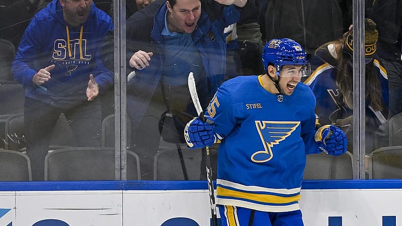 Dec 16, 2023; St. Louis, Missouri, USA; St. Louis Blues center Jordan Kyrou (25) reacts after scoring against the Dallas Stars during the second period at Enterprise Center. Mandatory Credit: Jeff Curry-USA TODAY Sports