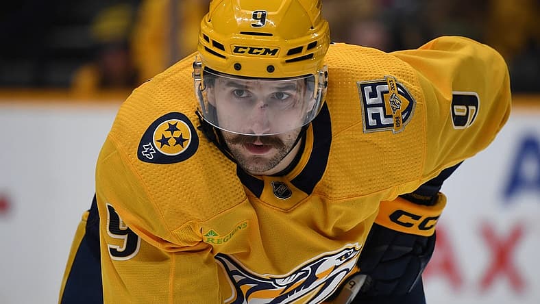 Dec 16, 2023; Nashville, Tennessee, USA; Nashville Predators left wing Filip Forsberg (9) waits for a face off during the third period against the Washington Capitals at Bridgestone Arena. Mandatory Credit: Christopher Hanewinckel-USA TODAY Sports