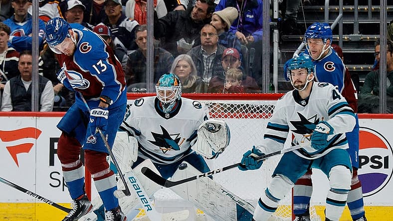 Dec 17, 2023; Denver, Colorado, USA; Colorado Avalanche right wing Valeri Nichushkin (13) screens San Jose Sharks goaltender Mackenzie Blackwood (29) on a shot as defenseman Kyle Burroughs (4) and right wing Mikko Rantanen (96) defend in the first period at Ball Arena. Mandatory Credit: Isaiah J. Downing-USA TODAY Sports