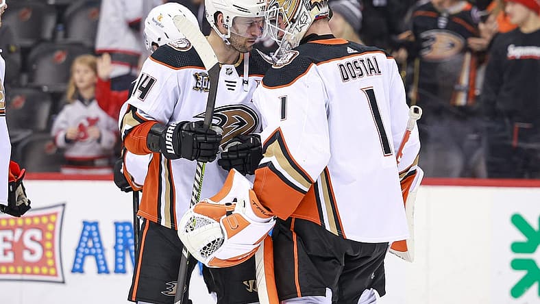 Dec 17, 2023; Newark, New Jersey, USA; Anaheim Ducks center Adam Henrique (14) celebrates with goaltender Lukas Dostal (1) after defeating the New Jersey Devils at Prudential Center. Mandatory Credit: Vincent Carchietta-USA TODAY Sports