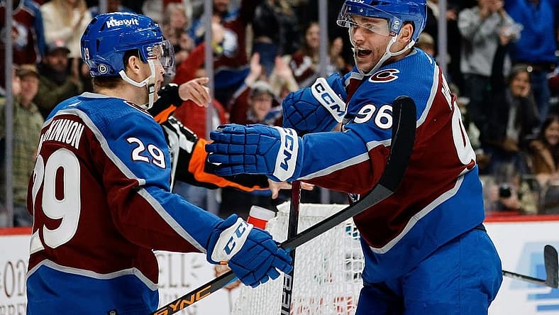 Dec 17, 2023; Denver, Colorado, USA; Colorado Avalanche center Nathan MacKinnon (29) celebrates his goal with right wing Mikko Rantanen (96) in the second period against the San Jose Sharks at Ball Arena. Mandatory Credit: Isaiah J. Downing-USA TODAY Sports