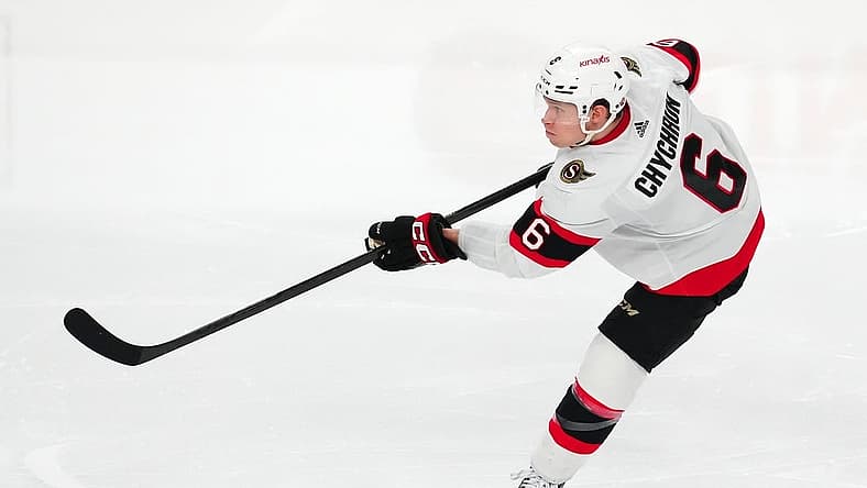 Dec 17, 2023; Las Vegas, Nevada, USA; Ottawa Senators defenseman Jakob Chychrun (6) shoots against the Vegas Golden Knights during the third period at T-Mobile Arena. Mandatory Credit: Stephen R. Sylvanie-USA TODAY Sports