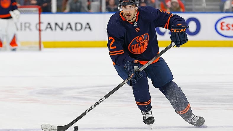 Dec 14, 2023; Edmonton, Alberta, CAN; Edmonton Oilers defensemen Evan Bouchard (2) makes a pass against the Tampa Bay Lightning at Rogers Place. Mandatory Credit: Perry Nelson-USA TODAY Sports