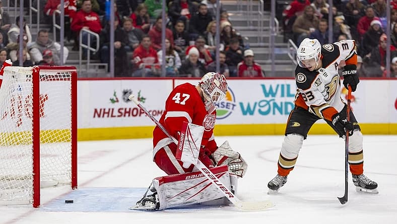 Dec 18, 2023; Detroit, Michigan, USA; The puck slips past Detroit Red Wings goaltender James Reimer (47) during the first period against the Anaheim Ducks at Little Caesars Arena. Mandatory Credit: Brian Bradshaw Sevald-USA TODAY Sports