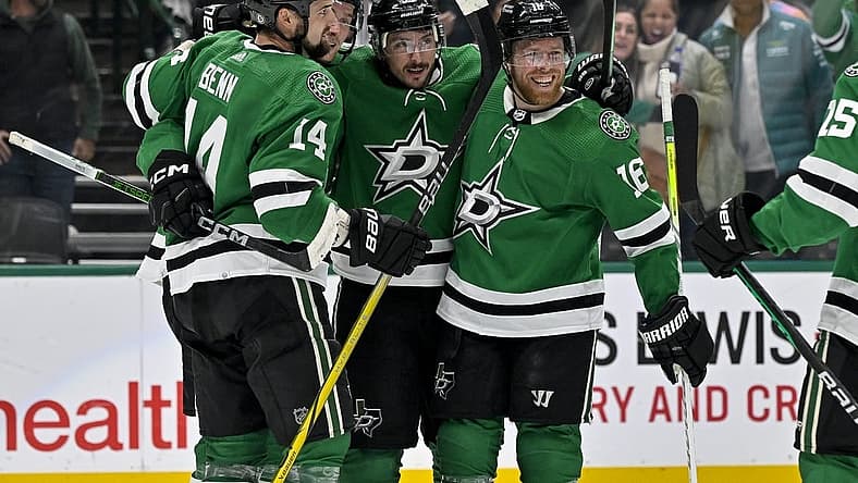 Dec 18, 2023; Dallas, Texas, USA; Dallas Stars center Matt Duchene (95) and defenseman Thomas Harley (55) and left wing Jamie Benn (14) and center Joe Pavelski (16) celebrate after Harley scores the game winning goal on a pass from Duchene against the Seattle Kraken during the overtime period at the American Airlines Center. Mandatory Credit: Jerome Miron-USA TODAY Sports