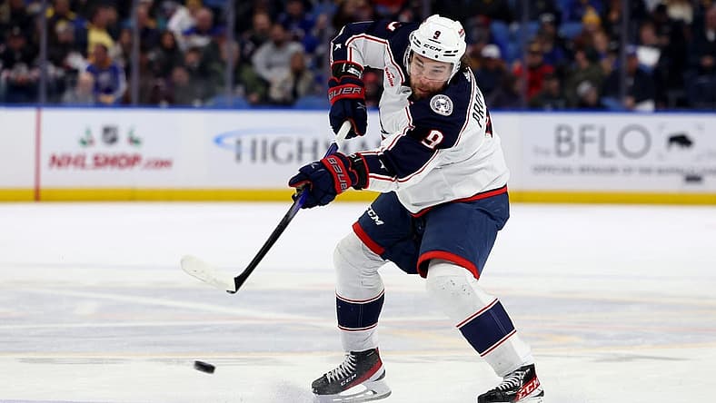 Dec 19, 2023; Buffalo, New York, USA; Columbus Blue Jackets defenseman Ivan Provorov (9) takes a shot on goal during the first period against the Buffalo Sabres at KeyBank Center. Mandatory Credit: Timothy T. Ludwig-USA TODAY Sports