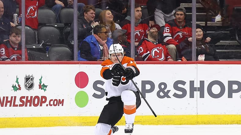 Dec 19, 2023; Newark, New Jersey, USA; Philadelphia Flyers right wing Owen Tippett (74) celebrates his game-winning goal against the New Jersey Devils during overtime at Prudential Center. Mandatory Credit: Ed Mulholland-USA TODAY Sports