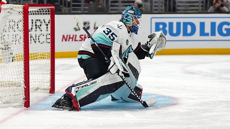 Dec 20, 2023; Los Angeles, California, USA; Seattle Kraken goaltender Joey Daccord (35) defends the goal against the LA Kings in the second period at Crypto.com Arena. Mandatory Credit: Kirby Lee-USA TODAY Sports