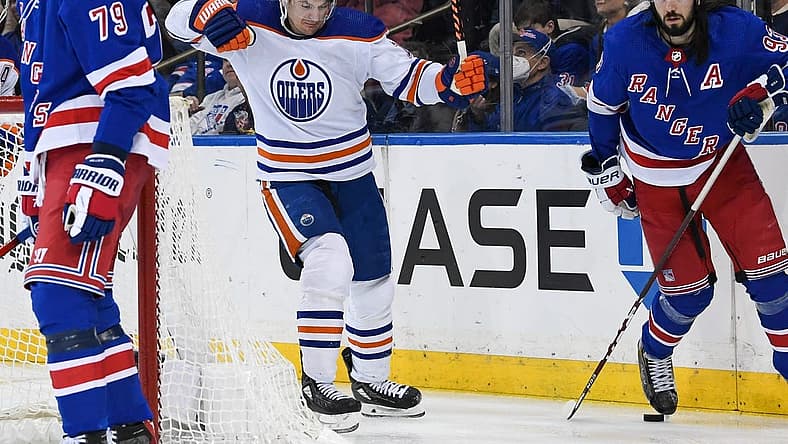 Dec 22, 2023; New York, New York, USA; Edmonton Oilers left wing Zach Hyman (18) celebrates his goal against the New York Rangers during the third period at Madison Square Garden. Mandatory Credit: Dennis Schneidler-USA TODAY Sports