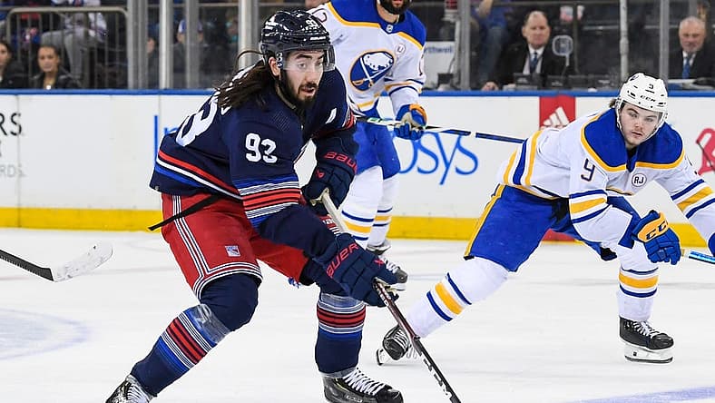 Dec 23, 2023; New York, New York, USA; New York Rangers center Mika Zibanejad (93) skates across the blue line against the Buffalo Sabres during the first period at Madison Square Garden. Mandatory Credit: Dennis Schneidler-USA TODAY Sports