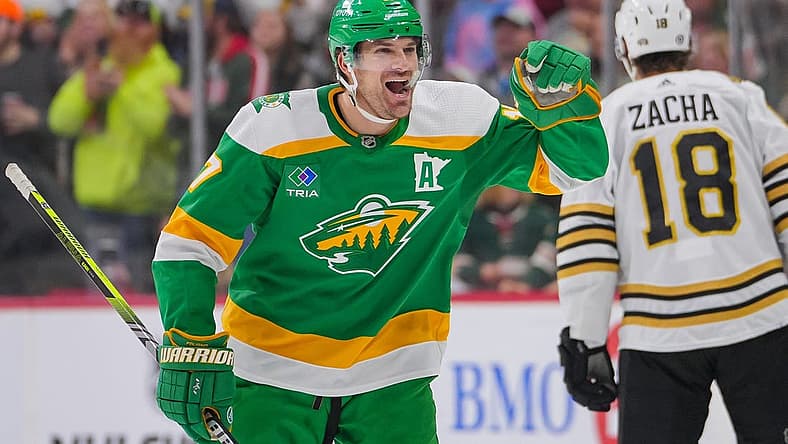Dec 23, 2023; Saint Paul, Minnesota, USA; Minnesota Wild left wing Marcus Foligno (17) celebrates his goal against the Boston Bruins in the third period at Xcel Energy Center. Mandatory Credit: Brad Rempel-USA TODAY Sports