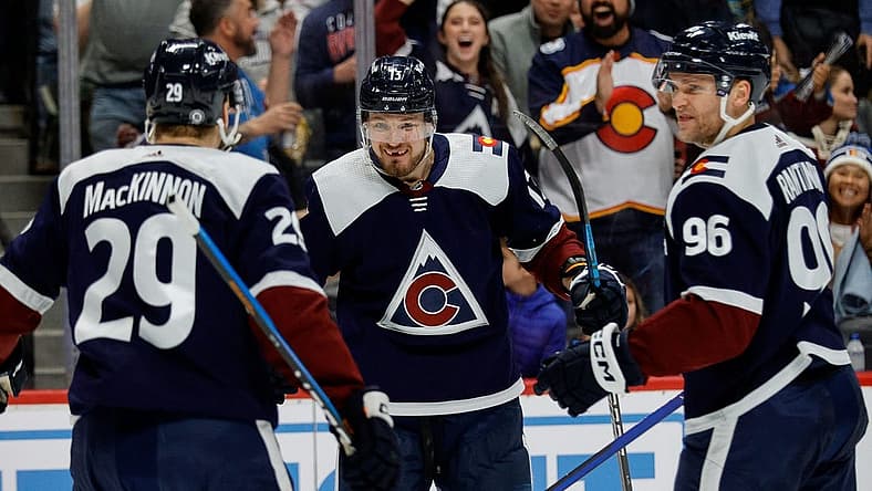 Dec 23, 2023; Denver, Colorado, USA; Colorado Avalanche right wing Valeri Nichushkin (13) celebrates his goal with center Nathan MacKinnon (29) and right wing Mikko Rantanen (96) in the second period against the Arizona Coyotes at Ball Arena. Mandatory Credit: Isaiah J. Downing-USA TODAY Sports