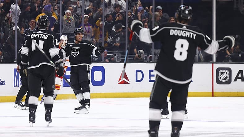 Dec 23, 2023; Los Angeles, California, USA; Los Angeles Kings right wing Quinton Byfield (55) celebrates after scoring a goal against the Calgary Flames during the third period of a game at Crypto.com Arena. Mandatory Credit: Jessica Alcheh-USA TODAY Sports