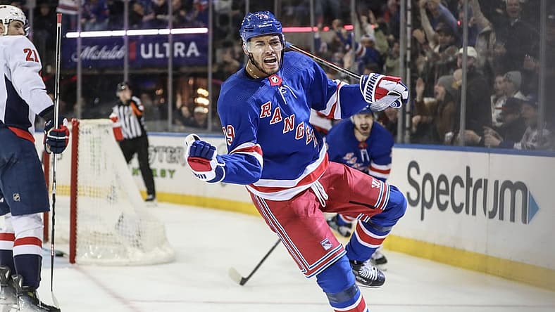 Dec 27, 2023; New York, New York, USA; New York Rangers defenseman K'Andre Miller (79) celebrates after scoring a goal in the second period against the Washington Capitals at Madison Square Garden. Mandatory Credit: Wendell Cruz-USA TODAY Sports