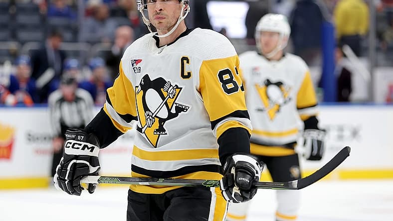 Dec 27, 2023; Elmont, New York, USA; Pittsburgh Penguins center Sidney Crosby (87) skates against the New York Islanders during the third period at UBS Arena. Mandatory Credit: Brad Penner-USA TODAY Sports