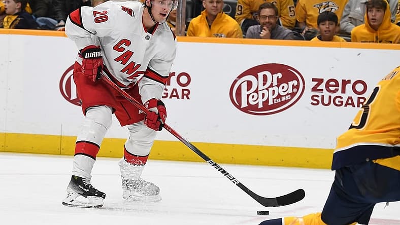 Dec 27, 2023; Nashville, Tennessee, USA; Carolina Hurricanes center Sebastian Aho (20) skates with the puck during the second period against the Nashville Predators at Bridgestone Arena. Mandatory Credit: Christopher Hanewinckel-USA TODAY Sports