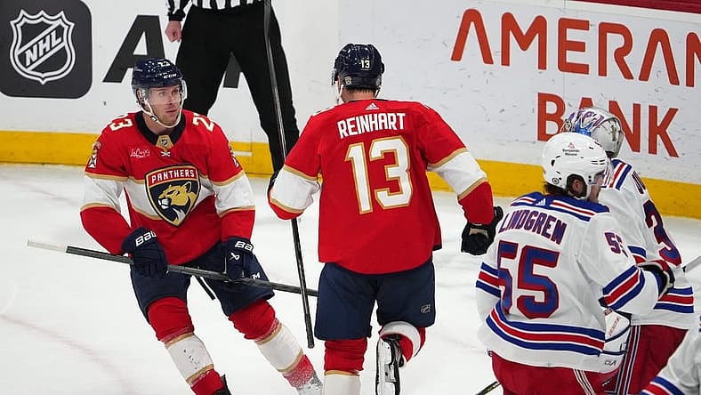Dec 29, 2023; Sunrise, Florida, USA; Florida Panthers center Sam Reinhart (13) celebrates his goal against the New York Rangers with center Carter Verhaeghe (23) during the second period at Amerant Bank Arena. Mandatory Credit: Jasen Vinlove-USA TODAY Sports