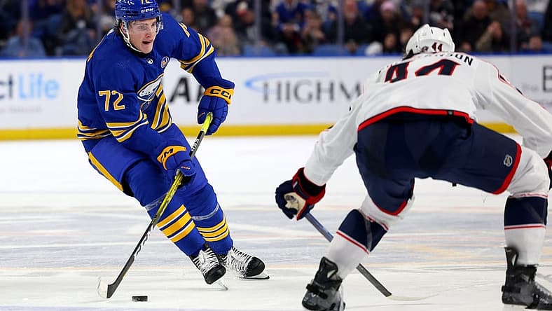 Dec 30, 2023; Buffalo, New York, USA; Columbus Blue Jackets defenseman Erik Gudbranson (44) looks to block a pass by Buffalo Sabres right wing Tage Thompson (72) during the second period at KeyBank Center. Mandatory Credit: Timothy T. Ludwig-USA TODAY Sports