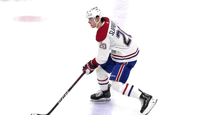 Dec 30, 2023; Sunrise, Florida, USA;  Montreal Canadiens left wing Juraj Slafkovsky (20) brings the puck up the ice against the Florida Panthers during the second period at Amerant Bank Arena. Mandatory Credit: Jim Rassol-USA TODAY Sports
