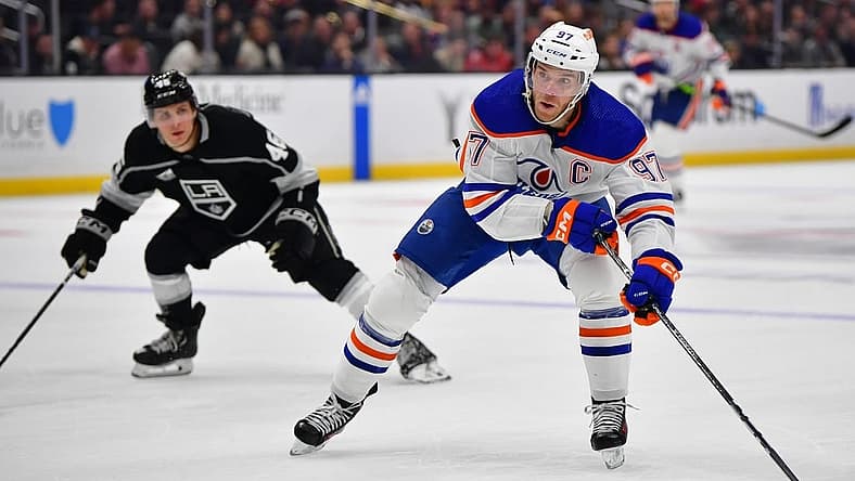 Dec 30, 2023; Los Angeles, California, USA; Edmonton Oilers center Connor McDavid (97) moves in for a shot on goal against the Los Angeles Kings during the third period at Crypto.com Arena. Mandatory Credit: Gary A. Vasquez-USA TODAY Sports
