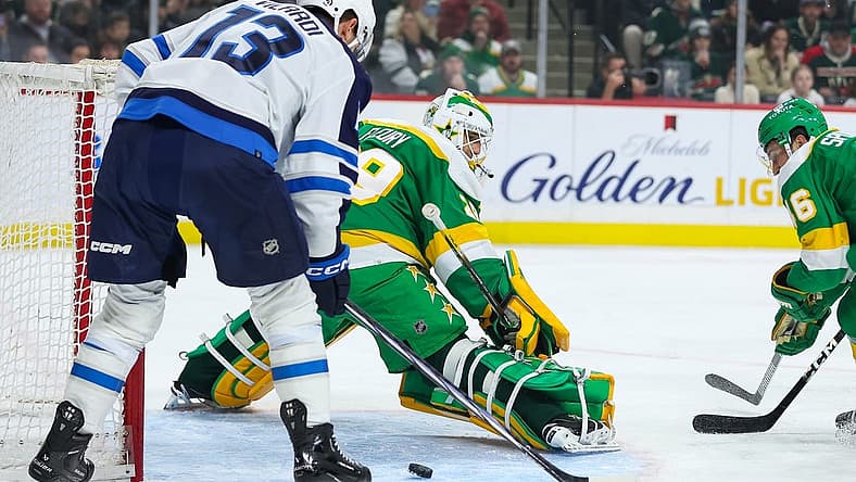 Dec 31, 2023; Saint Paul, Minnesota, USA; Minnesota Wild goaltender Marc-Andre Fleury (29) defends his net as Winnipeg Jets center Gabriel Vilardi (13) looks to shoot during the first period at Xcel Energy Center. Mandatory Credit: Matt Krohn-USA TODAY Sports