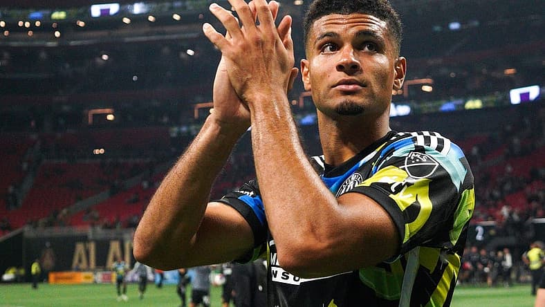 Nov 7, 2023; Atlanta, Georgia, USA; Atlanta United defender Miles Robinson (12) celebrates after defeating Columbus Crew at Mercedes-Benz Stadium. Mandatory Credit: Brett Davis -USA TODAY Sports