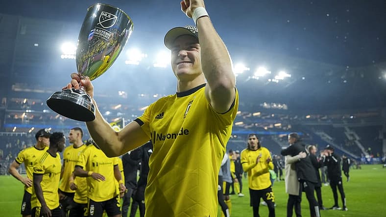 Dec 2, 2023; Cincinnati, Ohio, USA;  Columbus Crew defender Julian Gressel (7) celebrates with the trophy after defeating FC Cincinnati at TQL Stadium. Mandatory Credit: Aaron Doster-USA TODAY Sports