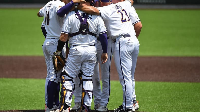 Jun 12, 2021; Nashville, TN, USA; East Carolina Pirates head coach Cliff Godwin (23) talks with his team on the mound during the ninth inning against the Vanderbilt Commodores in the Nashville Super Regional of the NCAA Baseball Tournament at Hawkins Field. Mandatory Credit: Christopher Hanewinckel-USA TODAY Sports