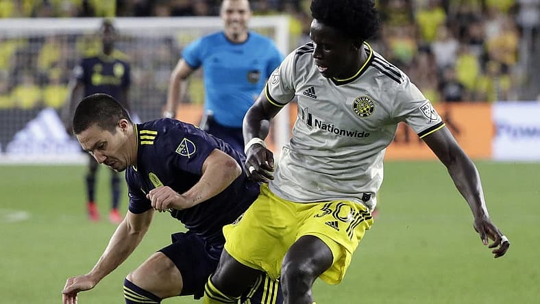 Defender Aboubacar Keita, right.