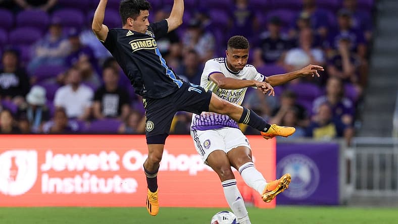 Jun 21, 2023; Orlando, Florida, USA; Orlando City SC defender Rafael Santos (3) passes the ball past Philadelphia Union midfielder Joaquin Torres (19) in the first half at Exploria Stadium. Mandatory Credit: Nathan Ray Seebeck-USA TODAY Sports