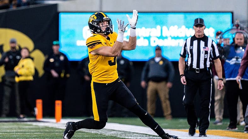 Iowa defensive back Cooper DeJean (3) catches a punt at Kinnick Stadium on Saturday, October 21, 2023 in Iowa City. DeJean returned the punt for a touchdown and it was later called back after review ruled he fair-caught the punt.