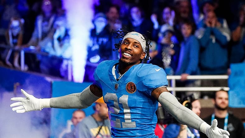 Detroit Lions safety Tracy Walker III (21) is being introduced before the Green Bay Packers game at Ford Field in Detroit on Thursday, Nov. 23, 2023.
