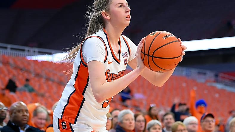 Nov 30, 2023; Syracuse, New York, USA; Syracuse Orange guard Georgia Woolley (5) shoots the ball against the Alabama Crimson Tide during the first half at the JMA Wireless Dome. Mandatory Credit: Rich Barnes-USA TODAY Sports