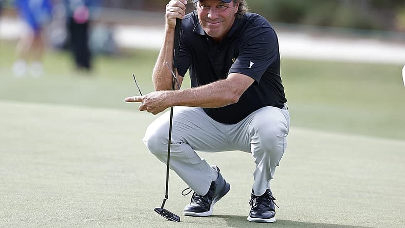 Dec 8, 2023; Bradenton, Florida, USA; Team International s Stephen Ames lines up a putt during their morning round at The Concession Golf Club. Mandatory Credit: Jeff Swinger-USA TODAY Sports