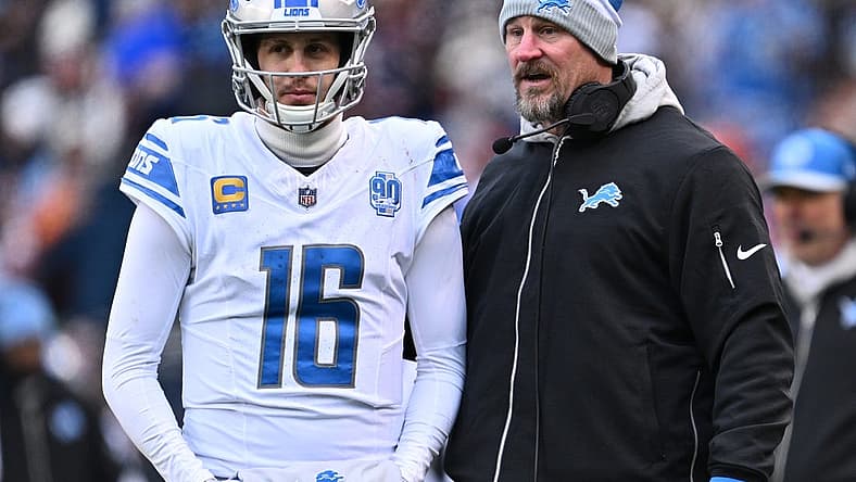 Dec 10, 2023; Chicago, Illinois, USA; Detroit Lions head coach Dan Campbell talks with quarterback Jared Goff (16) in the first half against the Chicago Bears at Soldier Field. Mandatory Credit: Jamie Sabau-USA TODAY Sports