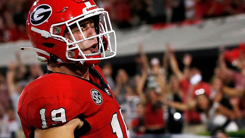 Georgia tight end Brock Bowers (19) celebrates after scoring a touchdown during the first half of a NCAA college football game against UAB in Athens, Ga., on Saturday, Sept. 23, 2023.