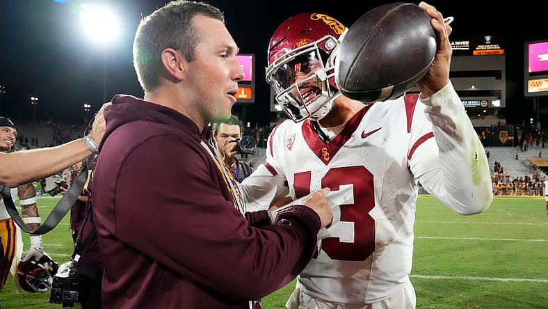 Arizona State Sun Devils head coach Kenny Dillingham congratulates USC Trojans quarterback Caleb Williams (13) on his 42-28 win at Mountain America Stadium on Sep 23, 2023.